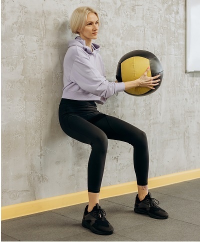 Wall Squat - A Good Exercise to Prevent and When Having Runner's Knee