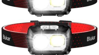 Two Blukar rechargeable head torches worn on red and black adjustable headbands, both switched on showing powerful dual LED lights (one bright white spotlight and one warm floodlight beam) illuminating forward intensely. Includes USB-C charging cables below. Ideal for running, camping, hiking, emergencies, and outdoor activities. IPX5 waterproof, motion sensor, multiple modes, long battery life.